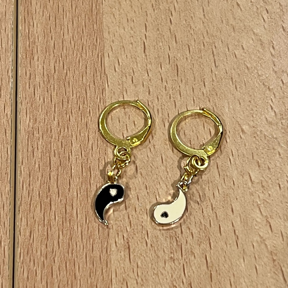 Yin and yang dangling hoop earrings